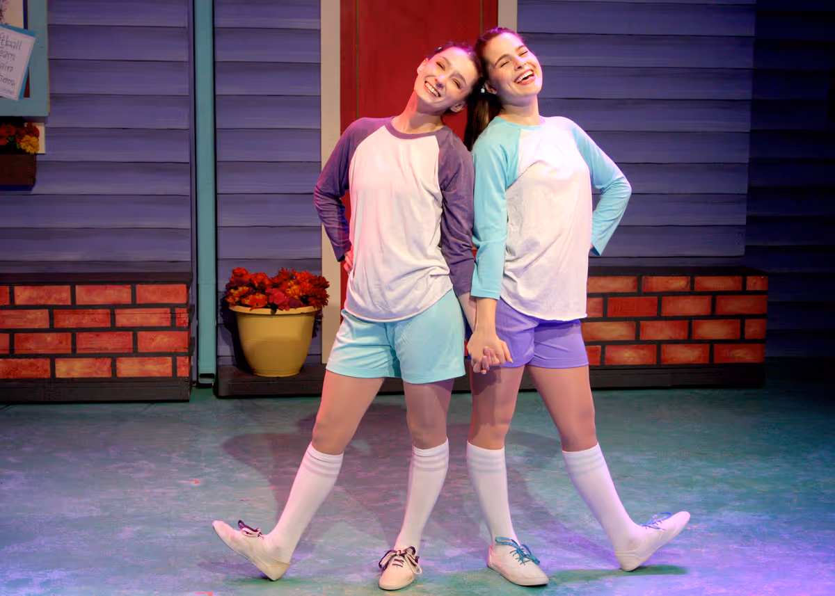 Alyssa Corella as Wanda and Gabbie Adner as Rhonda in Chance Theater's TYA production of "Fancy Nancy, The Musical". Playing through June 19, 2022, this musical adaptation of the popular book series has book and lyrics by Susan DiLallo, music and lyrics by Danny Abosch, and is directed by Laura M. Hathaway and music directed by Robyn Manion. Photo by Doug Catiller.