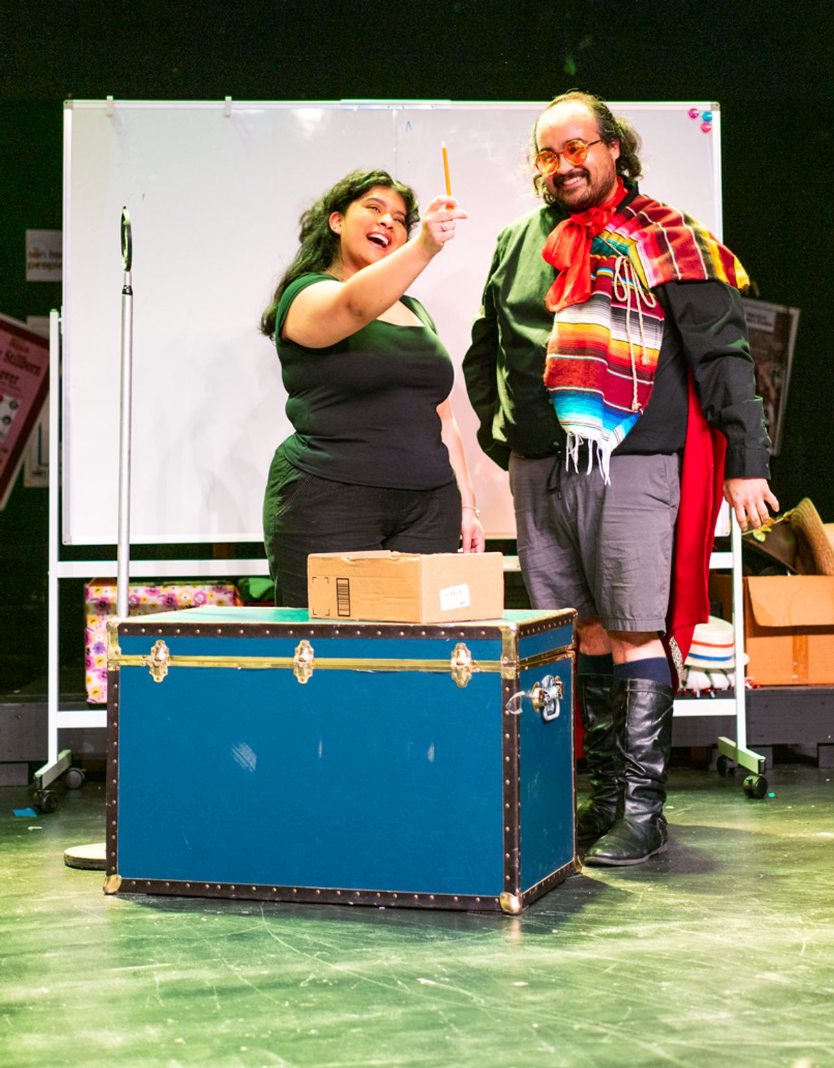 Anette Orellana as Liliana Tzintz n and Henry Ballesteros as Fernando Calder n in Spit in Your Face by Paul Heller and Alberto Lomnitz Credit: Christine Bedenis, Detroit Repertory Theatre Anette Orellana as Liliana Tzintz n and Henry Ballesteros as Fernando Calder n in Spit in Your Face by Paul Heller and Alberto Lomnitz Credit: Christine Bedenis, Detroit Repertory Theatre