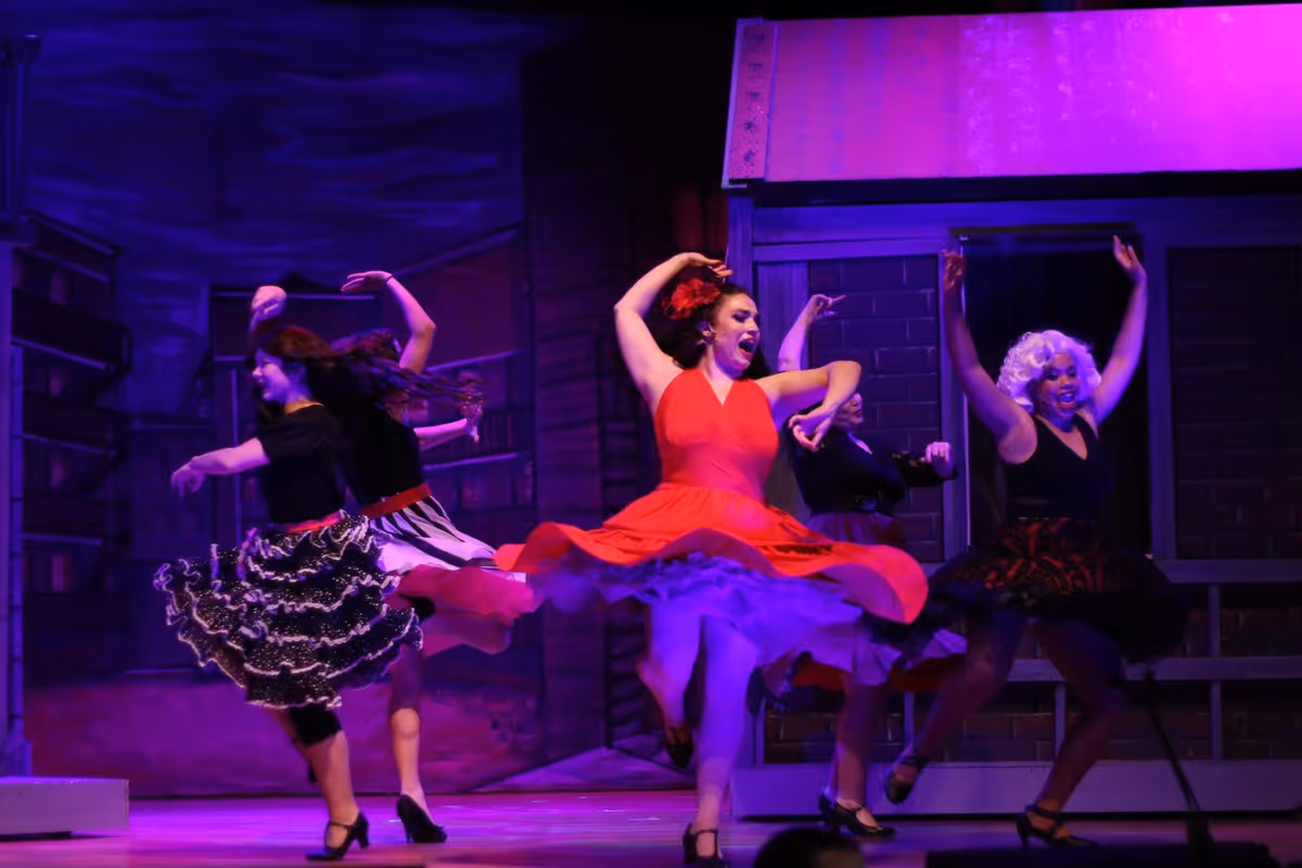 Anita dances with the Shark girls in 'America'. Anita dances with the Shark girls in 'America'.