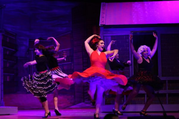 Anita dances with the Shark girls in 'America'. 1