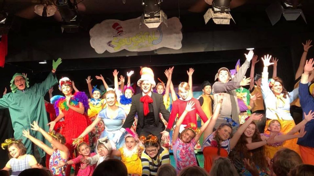 Cast photo after curtain call. Cast photo after curtain call.