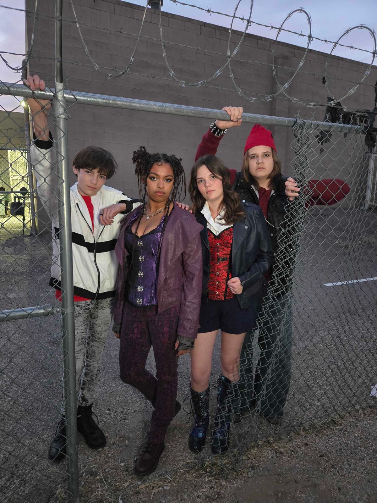 Michael Schut as Carlos, Marley Crump as Mal, Bea Busby as Evie, and Brady Gonzales as Jay