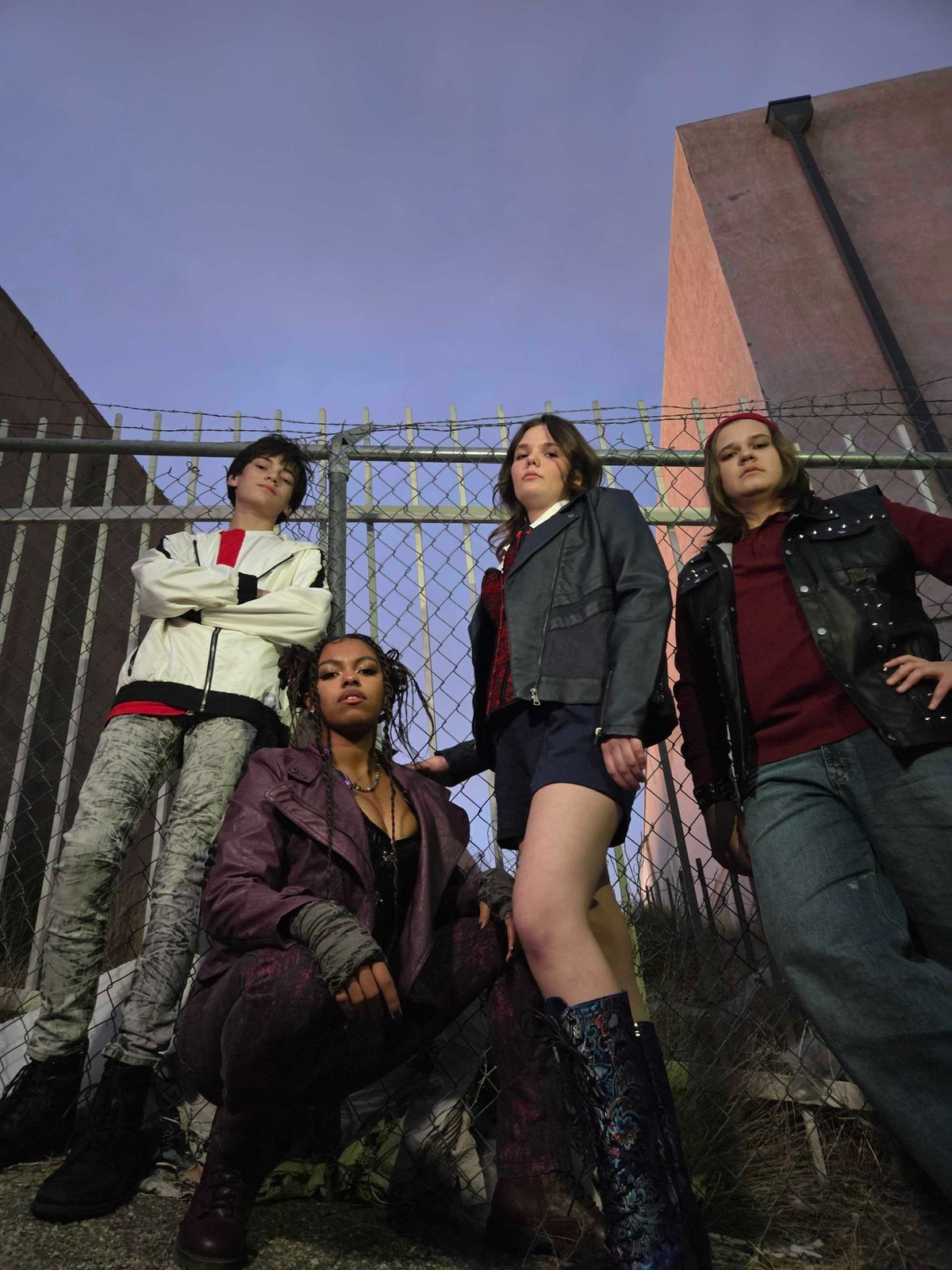 Michael Schut as Carlos, Marley Crump as Mal, Bea Busby as Evie, and Brady Gonzales as Jay