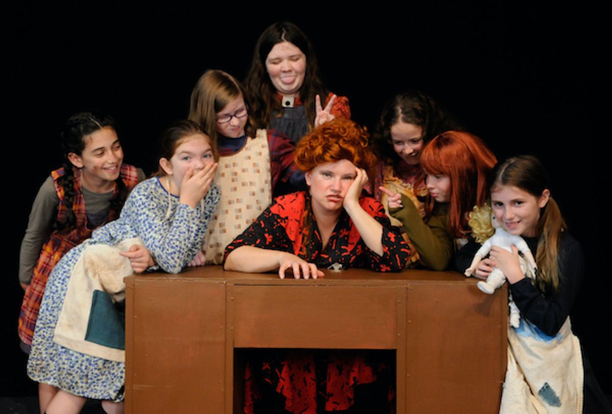 Eve-Marie Webster (center) as Miss Hannigan, with "Little Girls" (l-r) Sophie Appel, Samantha
Boragine, Samantha Bardon, Jillian Reeve, Marley Shaw, Olivia Dufresne and Emma Sheldon.

Photo credit: Robert Emerson