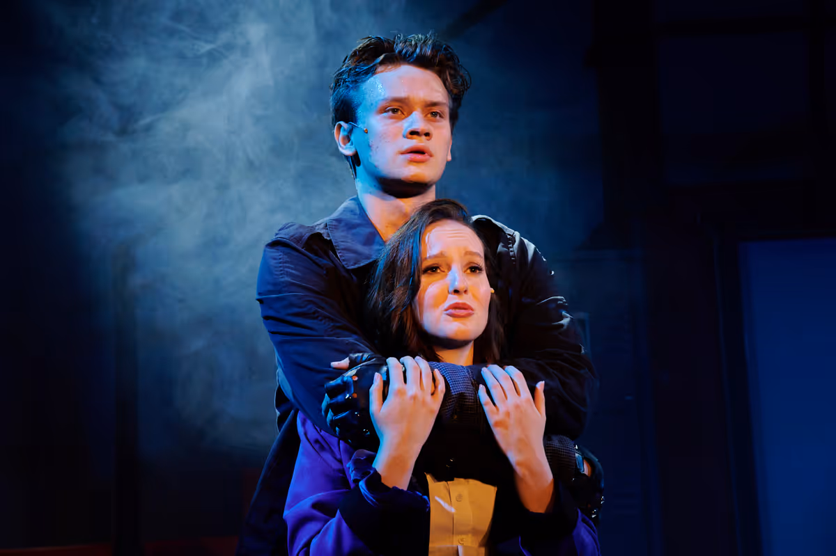 Noah Sucato and DJ Coon portray Jason Dean (JD) and Veronica Sawyer, respectively, in Scottsdale Desert Stages Theatre's 2022 production of Heathers the Musical: Teen Edition.  