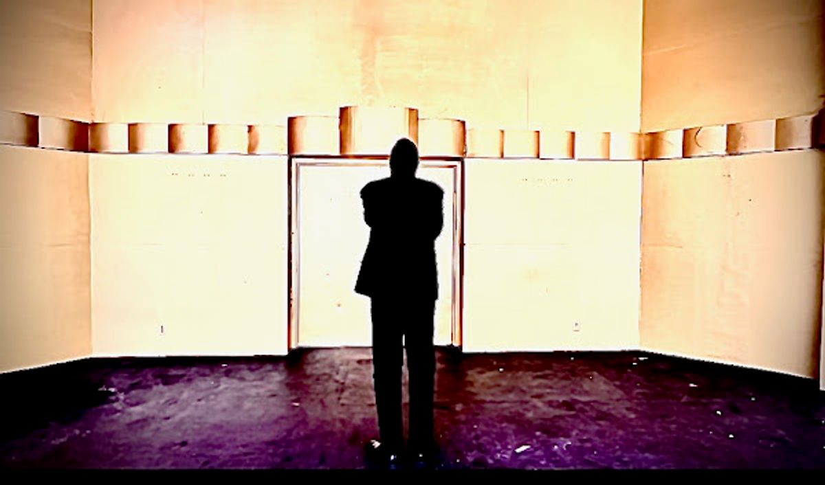 Pondering Poe: Veteran stage actor and play director Darryl Maximilian Robinson considers his choices upon the outdoor stage of Levitt Pavilion in LA's MacArthur Park for the video shoot of Edgar Allan Poe's 'The Conqueror Worm'. Photo by Danny Belrose. Pondering Poe: Veteran stage actor and play director Darryl Maximilian Robinson considers his choices upon the outdoor stage of Levitt Pavilion in LA's MacArthur Park for the video shoot of Edgar Allan Poe's 'The Conqueror Worm'. Photo by Danny Belrose.