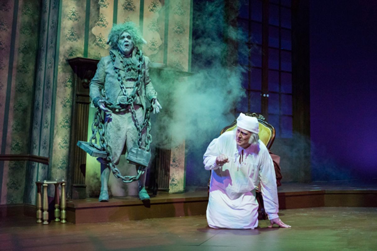 Marley (George Thagard) appears to Scrooge (Jeff Wilson) in Theatre Tuscaloosa's production of Romulus Linney's adaptation of "A Christmas Carol." Photo by Porfirio Solorzano.