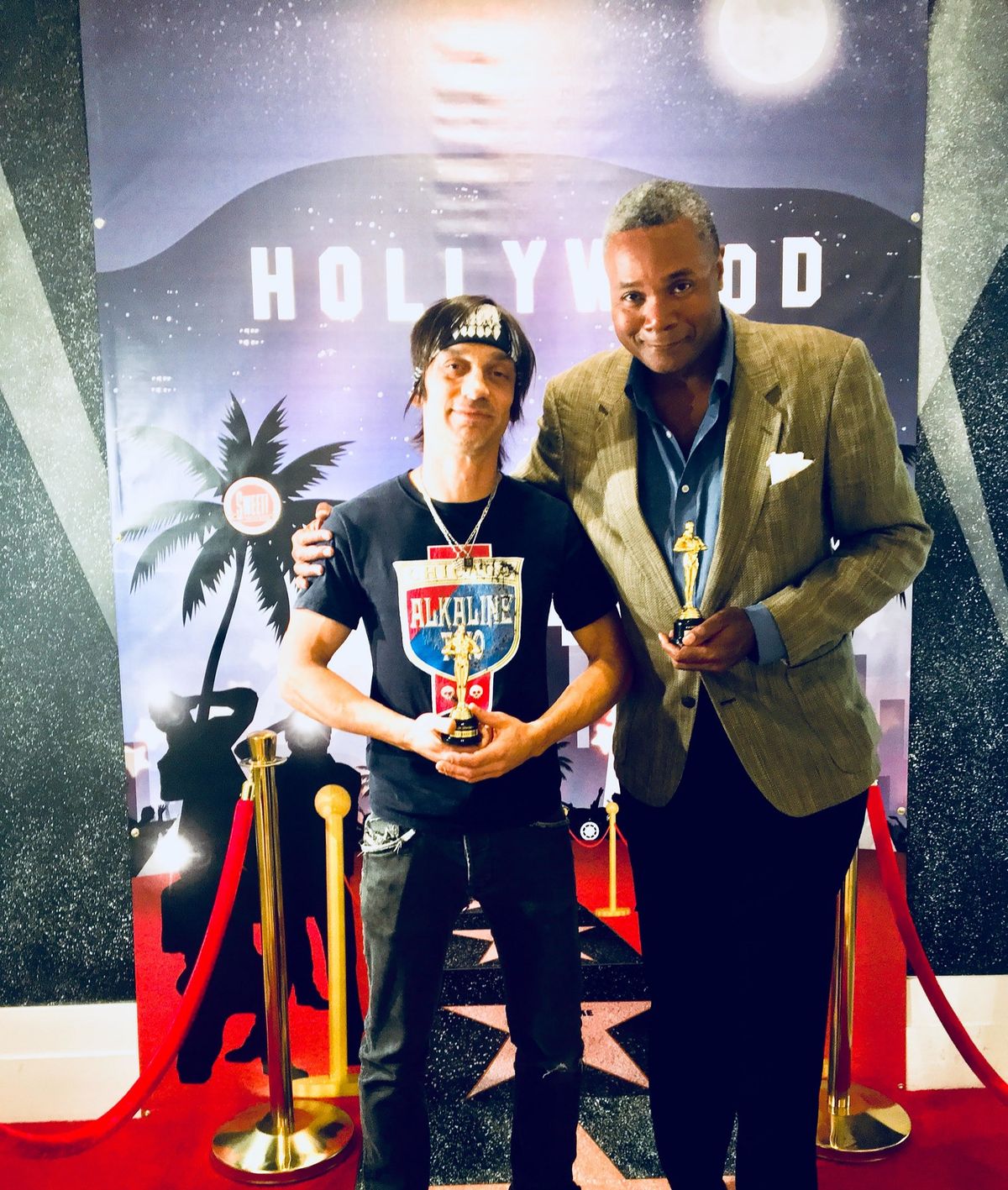 Chicago Stage Actors Can Dream: Just For Laughs during a 2017 visit to Sweet! in Hollywood, ESC of Chicago Founder Darryl Maximilian Robinson and Trap Door Theatre Alum Danny Belrose held FAKE OSCARS.