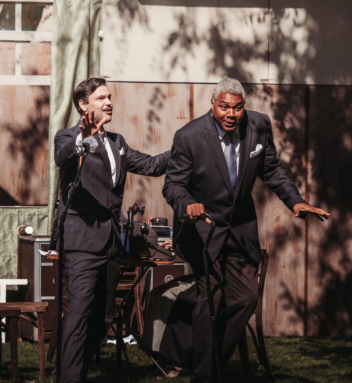 Sort Of A Jack London Style!: Rizzy Fuentes as Walter Burns inspires a news story in Darryl Maximilian Robinson as Roy V. Bensinger in The CCPT revival of THE FRONT PAGE.