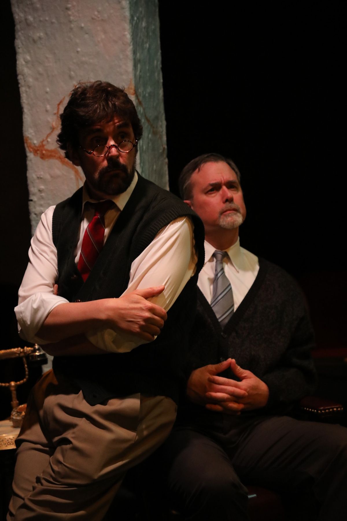 Professor Higgins (Phil Gallagher) and Col. Pickering (Randy Dalmas) observe Eliza
