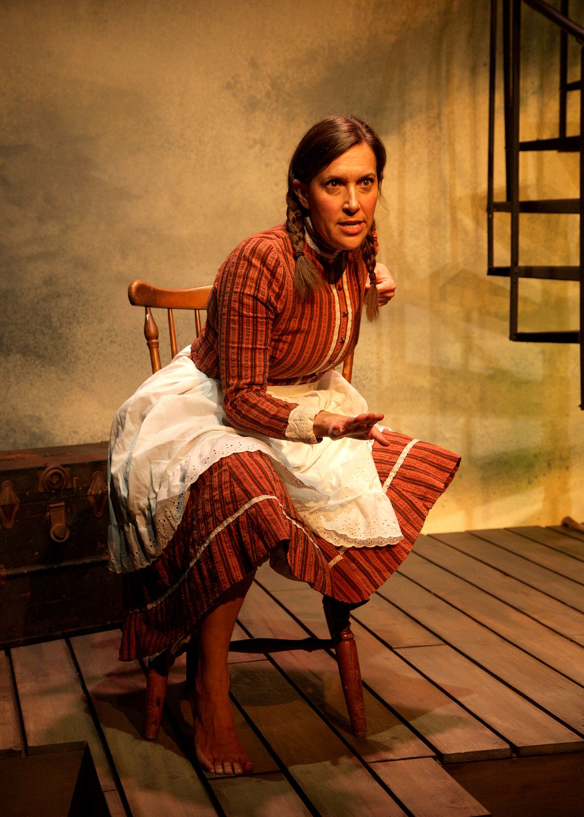 Aubrey Saverino as Abigail Burgess in the world premiere of "Matinicus: The Story of Abigail Burgess" playing May 5 - June 4, 2023 at Bette Aitken theater arts Center on the Fyda-Mar stage at Chance Theater. Written by Jenny Connell Davis; Directed by Katie Chidester. Photo by Doug Catiller.