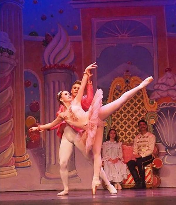 Edward R. Cox as Uncle Drosselmayer performs magic to entertain the Party Children. 3