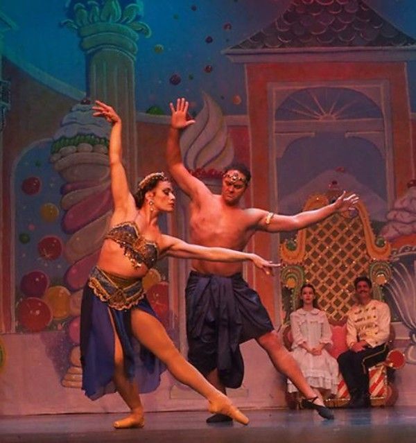 Edward R. Cox as Uncle Drosselmayer performs magic to entertain the Party Children. 4