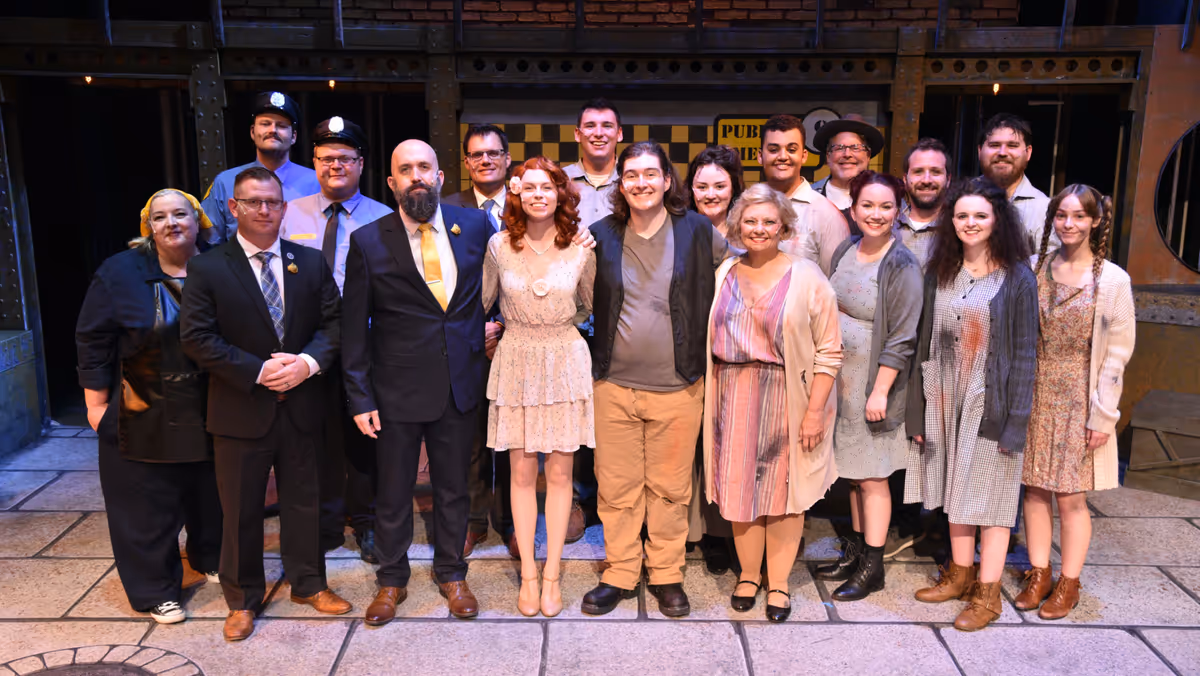 The Cast of Aurora Community Theatre's production of Urinetown: The Musical
Photo Credit: Jerry Hayes The Cast of Aurora Community Theatre's production of Urinetown: The Musical
Photo Credit: Jerry Hayes