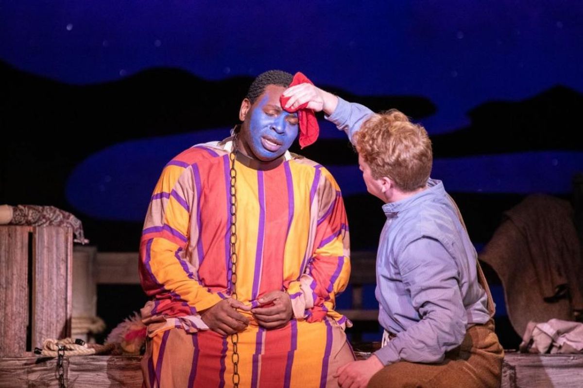 Jim (Khawon Porter) and Huckleberry Finn (Christopher Inhulsen) in Temple Theatre's production of Big River.  Photo By: Ben Bashinski 