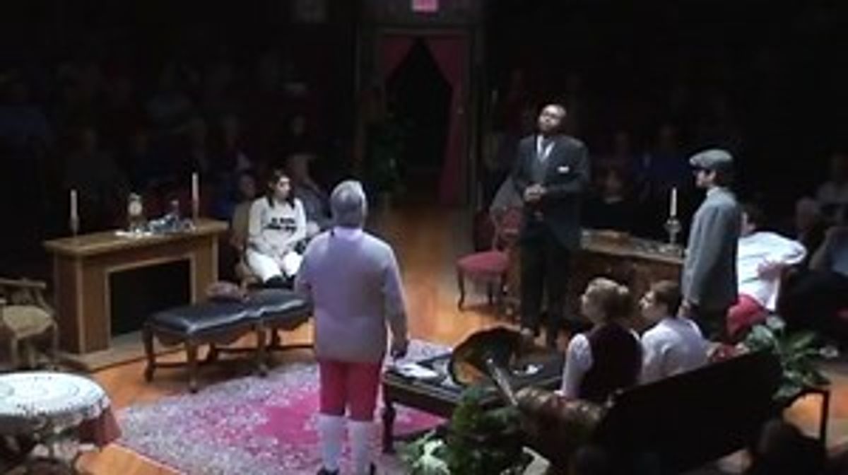 Surrounded by Members of The Biddle Family, Darryl Maximilian Robinson as The Butler John Lawless ( center right ) engages in a discussion regarding the prohibition of wine in the 2011 Glendale Centre Theatre 55th Anniversary Revival Production of Kyle Crichton's The Happiest Millionaire. Photo courtesy of Dash Porter.