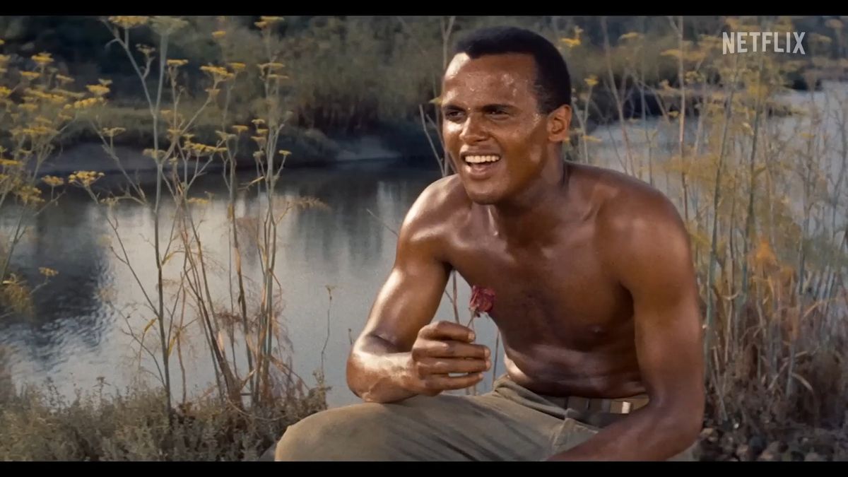 SINGING ABOUT A DANGEROUS LADY!: Though his songs were dubbed ( the score was more operatic than the style of singing  he was known for ) Harry Belafonte gave an impressive onscreen performance in "Carmen Jones".