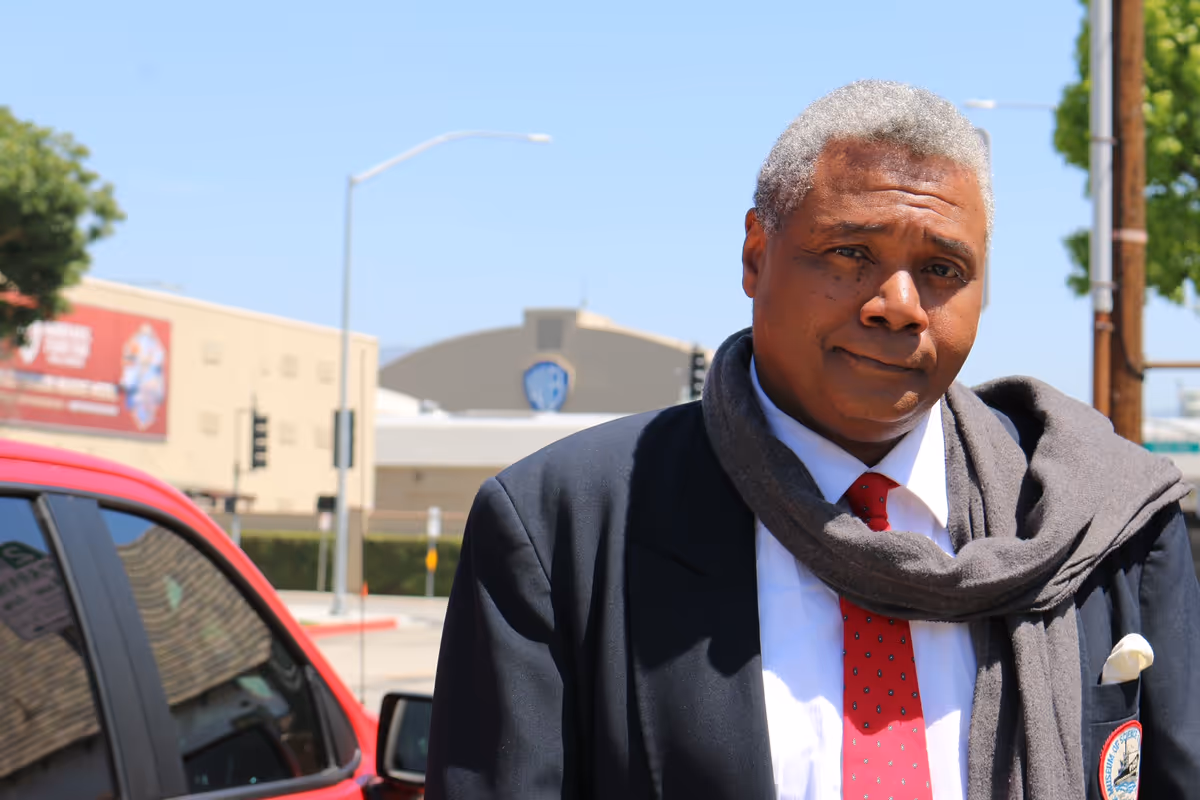 From a street bordering the famed Warner Bros. Hollywood Studios in Burbank, CA., veteran and award-winning stage actor and play director Darryl Maximilian Robinson ponders his visit to UBNGO Radio and Television Studio to appear for the fourth time on Ron Brewington's 'The Actor's Choice'. Photo by J.L. Watt.