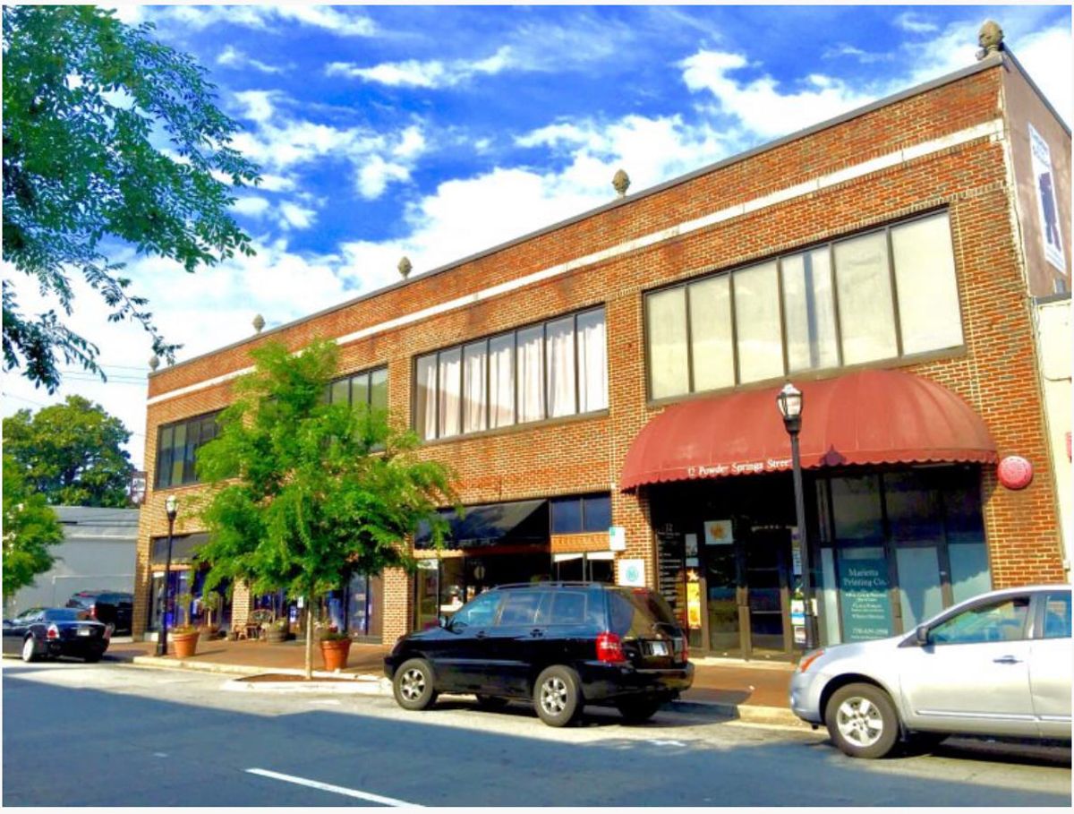 Street View/Outside Entrance   (doors under the red awning).