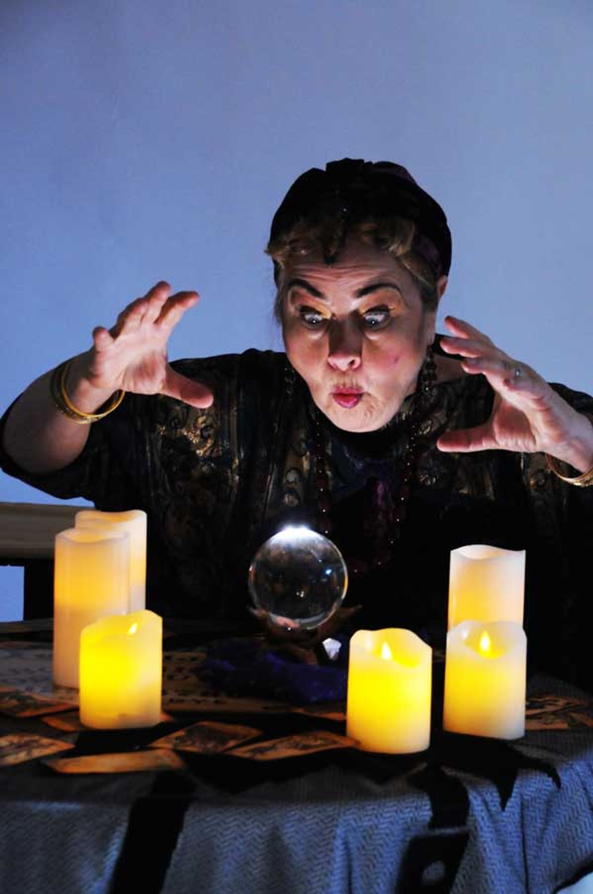 Madame Arcati (Caren Graham) summons the spirits in the classic Noël Coward comedy, BLITHE SPIRIT at Lakewood Theatre Company, September 9 - October 16, 2022 in Lake Oswego, Oregon. Photo by Triumph Photography Madame Arcati (Caren Graham) summons the spirits in the classic Noël Coward comedy, BLITHE SPIRIT at Lakewood Theatre Company, September 9 - October 16, 2022 in Lake Oswego, Oregon. Photo by Triumph Photography