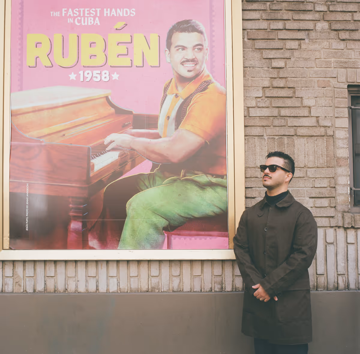 Jes s Pupo beside the Young Rub n character poster outside the Gerald Schoenfeld Theatre in New York City. Pupo portrays Young Rub n in Broadway?s Buena Vista Social Club. October 2026. Photo by