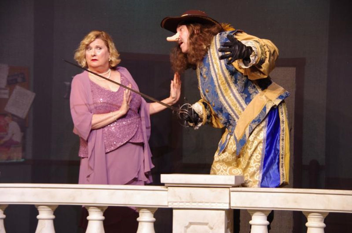 All the World?s A Stage as the curtain rises on Ken Ludwig?s rollicking farce Moon Over Buffalo Pictured Left to Right is Charlotte Hay (Sue Chekaway of Bloomfield Hills) and George Hay (Michael A. Gravame of Detroit). All the World?s A Stage as the curtain rises on Ken Ludwig?s rollicking farce Moon Over Buffalo Pictured Left to Right is Charlotte Hay (Sue Chekaway of Bloomfield Hills) and George Hay (Michael A. Gravame of Detroit).