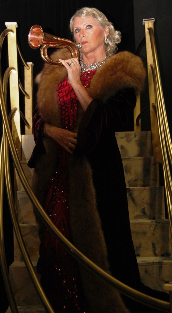 Mame Dennis (Patty Ward) charms the husk right out of the corn in the musical comedy, MAME. 1