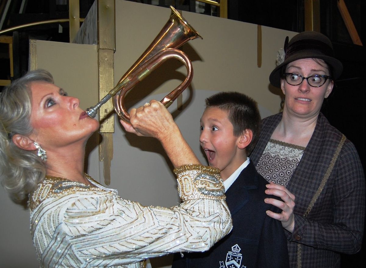 Mame Dennis (Patty Ward) blows her bugle to declare” It’s Today” as Young Patrick Dennis (Jonas Annear) and Agnes Gooch (Kathleen Duffy) look on. Mame Dennis (Patty Ward) blows her bugle to declare” It’s Today” as Young Patrick Dennis (Jonas Annear) and Agnes Gooch (Kathleen Duffy) look on.