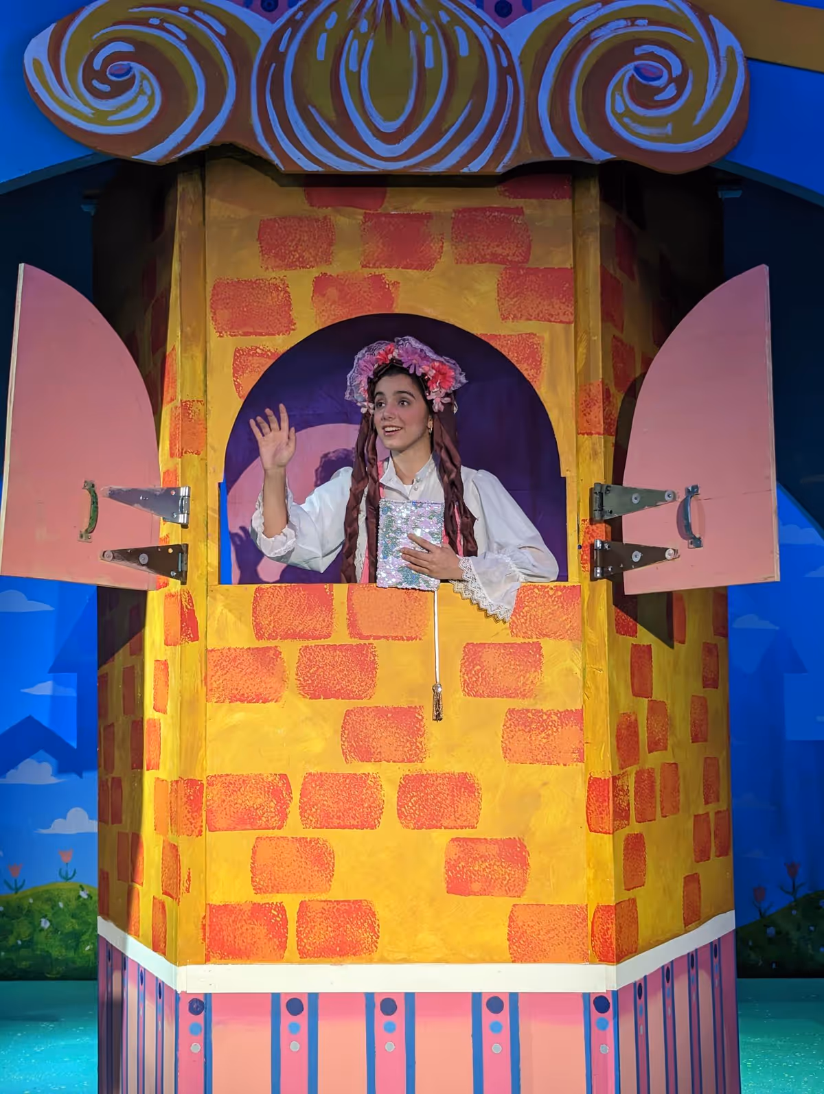 Rapunzel (Kelly Laines) sings "Picture Book"