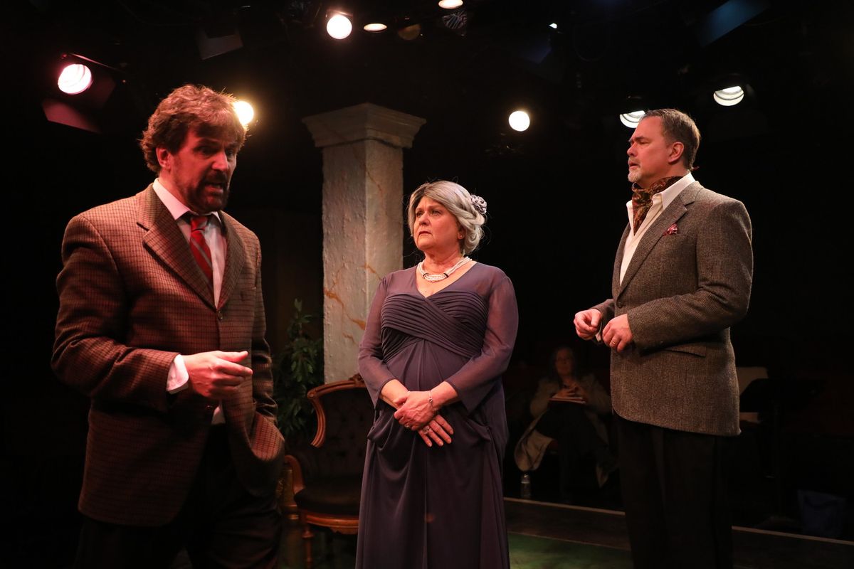 Mrs. Higgins (Hillary Mazer) scolds her son, Professor Higgins (Phil Gallagher) for his behavior.... while Col Pickering (Randy Dalmas)       www.spotlighters.org/Pygmalion       