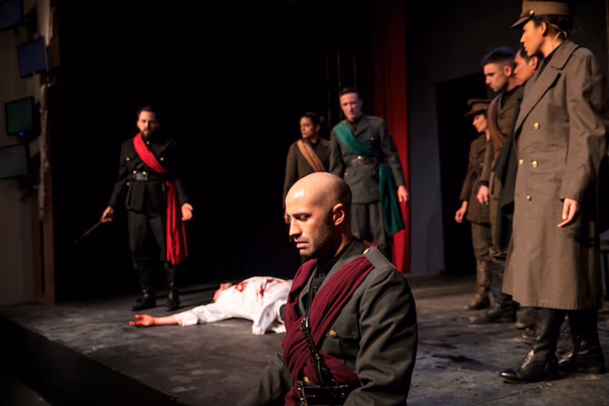Foreground: Sam Breen (Mark Antony) With Faqir Hassan (Brutus), David Melville (Julius Caesar), Kelvin Morales (Decius), Paul Turbiak (Cassius), Cynthia Boorujy (Metellus), John Ellsworth Philips (Cinna), Jose Acain (Lucilius), Philicia Saunders (Trebonius) Photo credit: Grettel Cortes Foreground: Sam Breen (Mark Antony) With Faqir Hassan (Brutus), David Melville (Julius Caesar), Kelvin Morales (Decius), Paul Turbiak (Cassius), Cynthia Boorujy (Metellus), John Ellsworth Philips (Cinna), Jose Acain (Lucilius), Philicia Saunders (Trebonius) Photo credit: Grettel Cortes