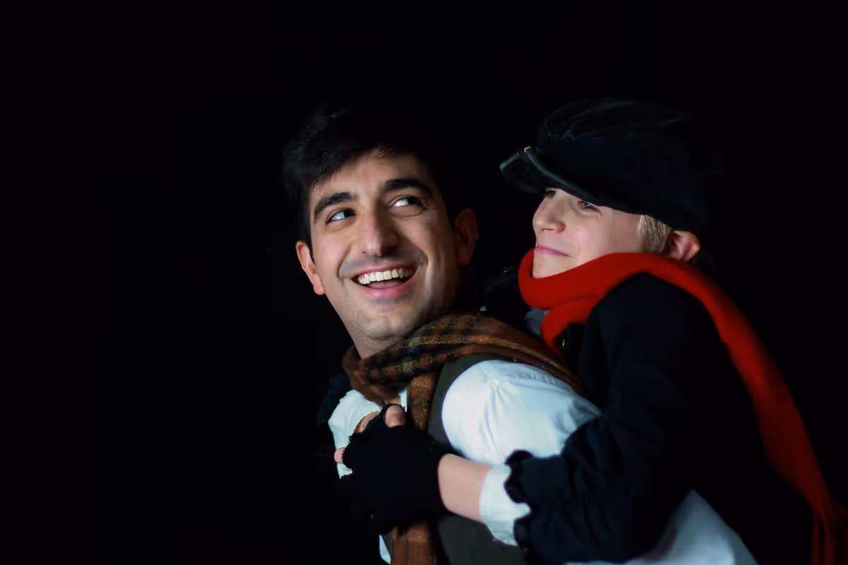Andrew Berardi as Bob Cratchit and Lucas Mather as Tiny Tim. Photo courtesy of Lauren Cibene Andrew Berardi as Bob Cratchit and Lucas Mather as Tiny Tim. Photo courtesy of Lauren Cibene