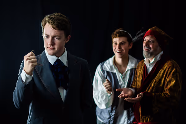 Jason Fussell as Young Ebenezer, Justin Spainhour-Roth as The Ghost of Christmas Past, and Darrell Meek as Scrooge. Photo courtesy of Lauren Cibene 4