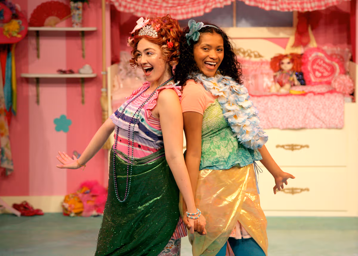 Jillian Batt as Nancy and Juliet Parker as Bree in Chance Theater's TYA production of "Fancy Nancy, The Musical". Playing through June 19, 2022, this musical adaptation of the popular book series has book and lyrics by Susan DiLallo, music and lyrics by Danny Abosch, and is directed by Laura M. Hathaway and music directed by Robyn Manion. Photo by Doug Catiller.