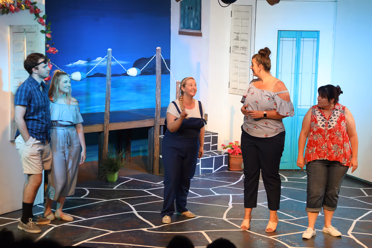 Donna (Katie Lambert) introduces Sophie (Quinlyn Ashlock) and Sky (Mychal Leverage) to Rosie (Susan Gibson) and Tanya (Hayley Hinckley). Donna (Katie Lambert) introduces Sophie (Quinlyn Ashlock) and Sky (Mychal Leverage) to Rosie (Susan Gibson) and Tanya (Hayley Hinckley).