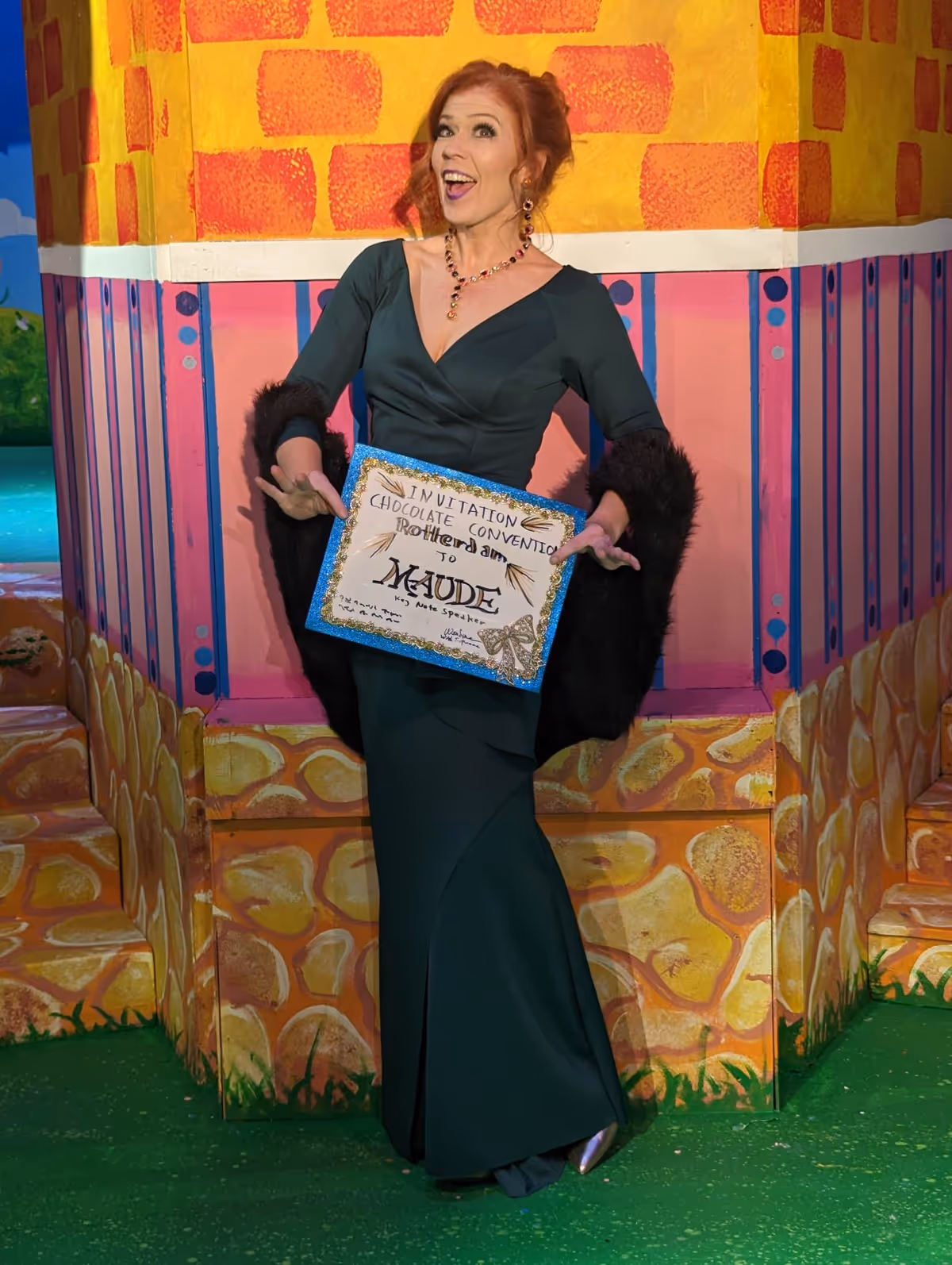 Maude (Ashley Smetherman Lemmler) receives her invitation to be keynote speaker at the Chocolate Convention in Rotterdam... dahm. Maude (Ashley Smetherman Lemmler) receives her invitation to be keynote speaker at the Chocolate Convention in Rotterdam... dahm.