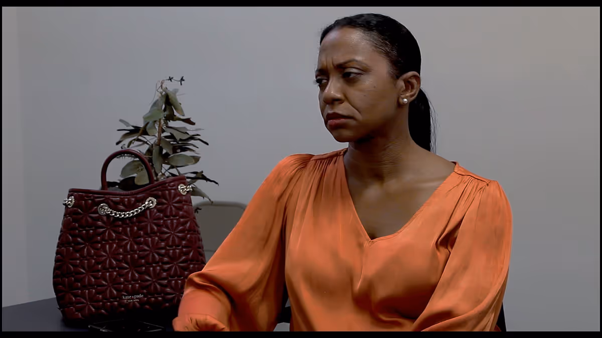 The Interviewer (Darlene Elizabeth Joiner) learns something about her past. The Interviewer (Darlene Elizabeth Joiner) learns something about her past.
