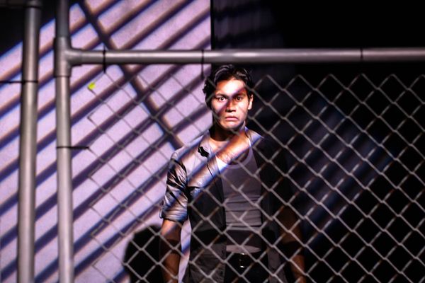 Convergence Theatre's production of Guerrilla Theatre Works: A New Nation shares immigration stories and the challenges faced in this changing nation.  Directed and choreographed by Elena Velasco, co-directed by Natalia Gleason.  Photography by Ethan Malamud.  Featuring Cristian Linares (photo).  1