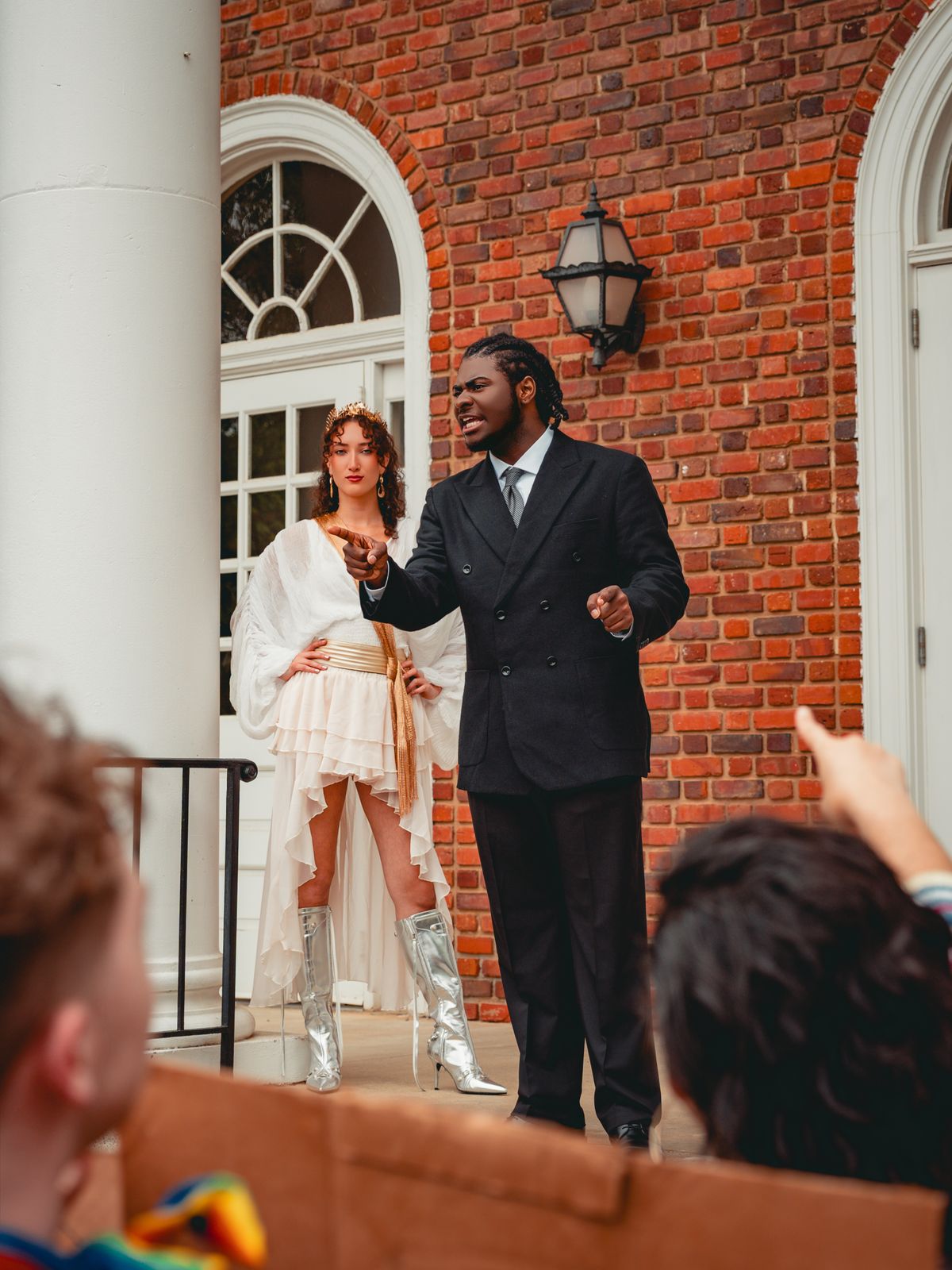 (L to R): Helena Padial (The Oracle) and Trevor Hudson (Calvin) for Antigone 1989: A Town Hall Musical. Photo by Geovanny Soto.