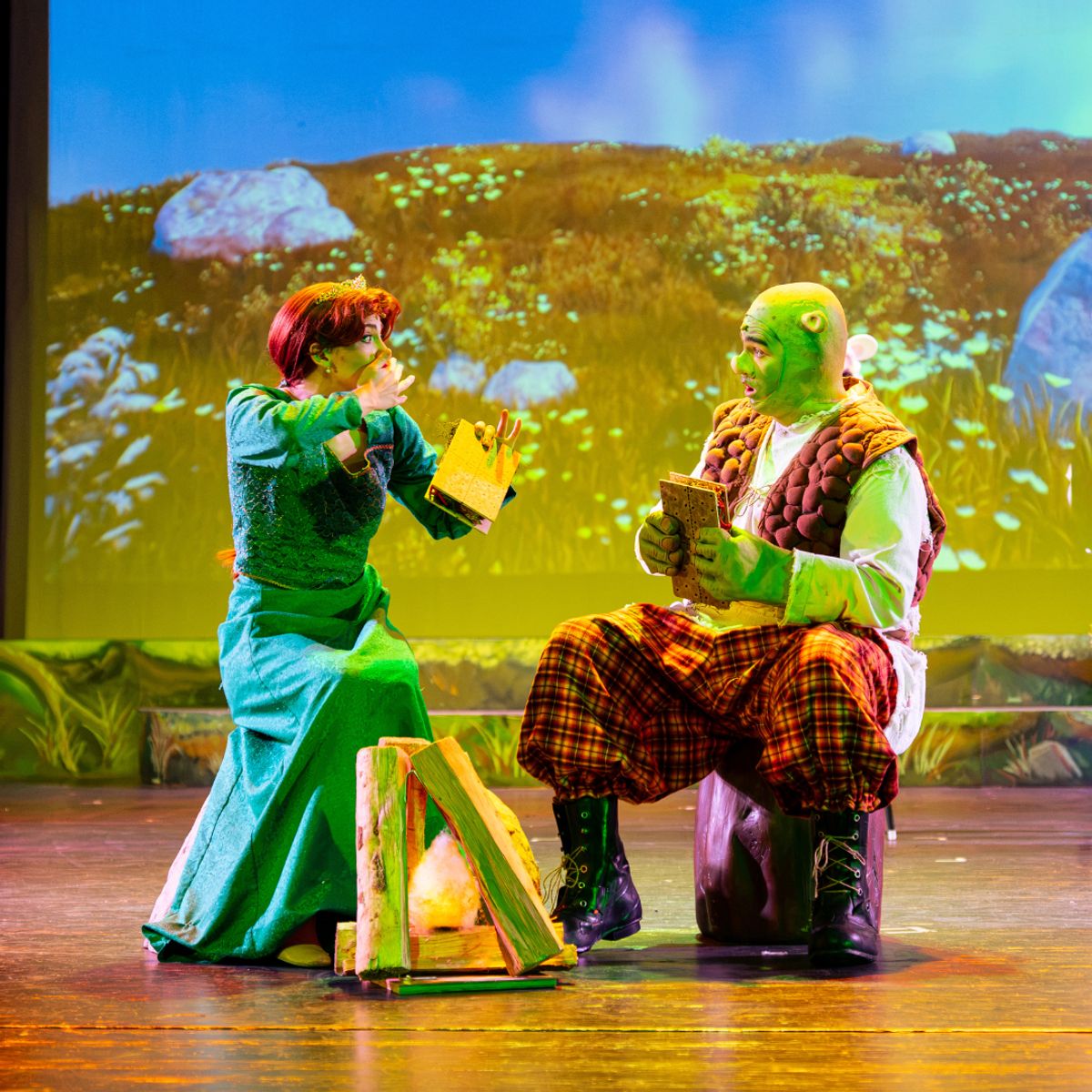 Emma Price as Princess Fiona and Matthew Robison as Shrek