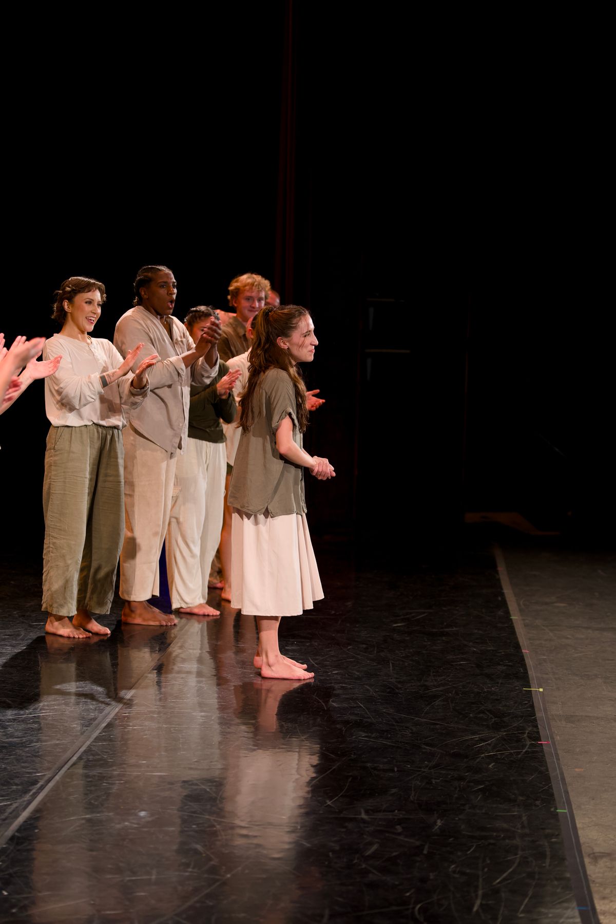 Adrienne Pelletier accepting a standing ovation for her choreography of Maine Dance Company's Unearthed Adrienne Pelletier accepting a standing ovation for her choreography of Maine Dance Company's Unearthed