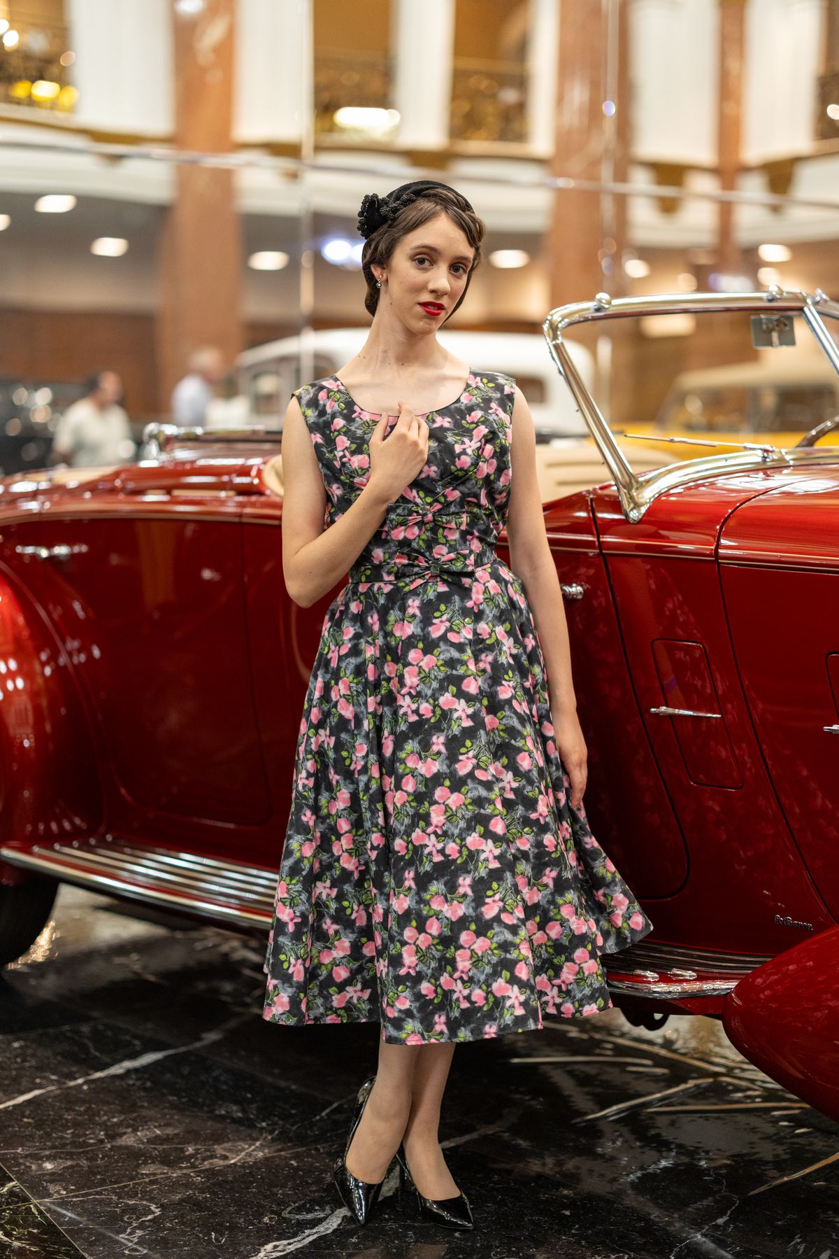 Rebekah Brannan as Betty Shaeffer by a classic car. Rebekah Brannan as Betty Shaeffer by a classic car.