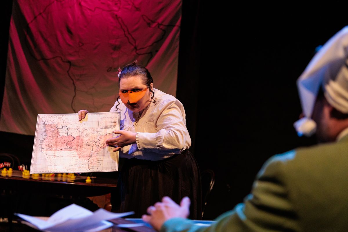 The Marquês de Penaquill (Hollie Pryor) goes over her new plans for colonizing Africa with Mr. Duck (Nate Speckman) in Heart of Duckness by A.J. Ditty. Photo by Kat Moraros Photography. The Marquês de Penaquill (Hollie Pryor) goes over her new plans for colonizing Africa with Mr. Duck (Nate Speckman) in Heart of Duckness by A.J. Ditty. Photo by Kat Moraros Photography.