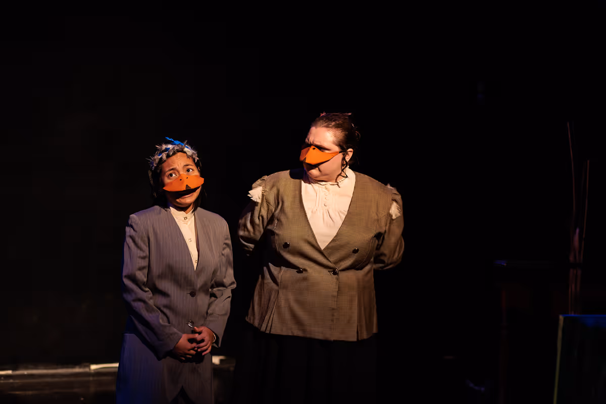 De Eend (Chris Say) tells the Marquês de Penaquill (Hollie Pryor) that she understands just how difficult it is being a female duck in a drake’s world in Heart of Duckness by A.J. Ditty. Photo by Kat Moraros Photography. De Eend (Chris Say) tells the Marquês de Penaquill (Hollie Pryor) that she understands just how difficult it is being a female duck in a drake’s world in Heart of Duckness by A.J. Ditty. Photo by Kat Moraros Photography.