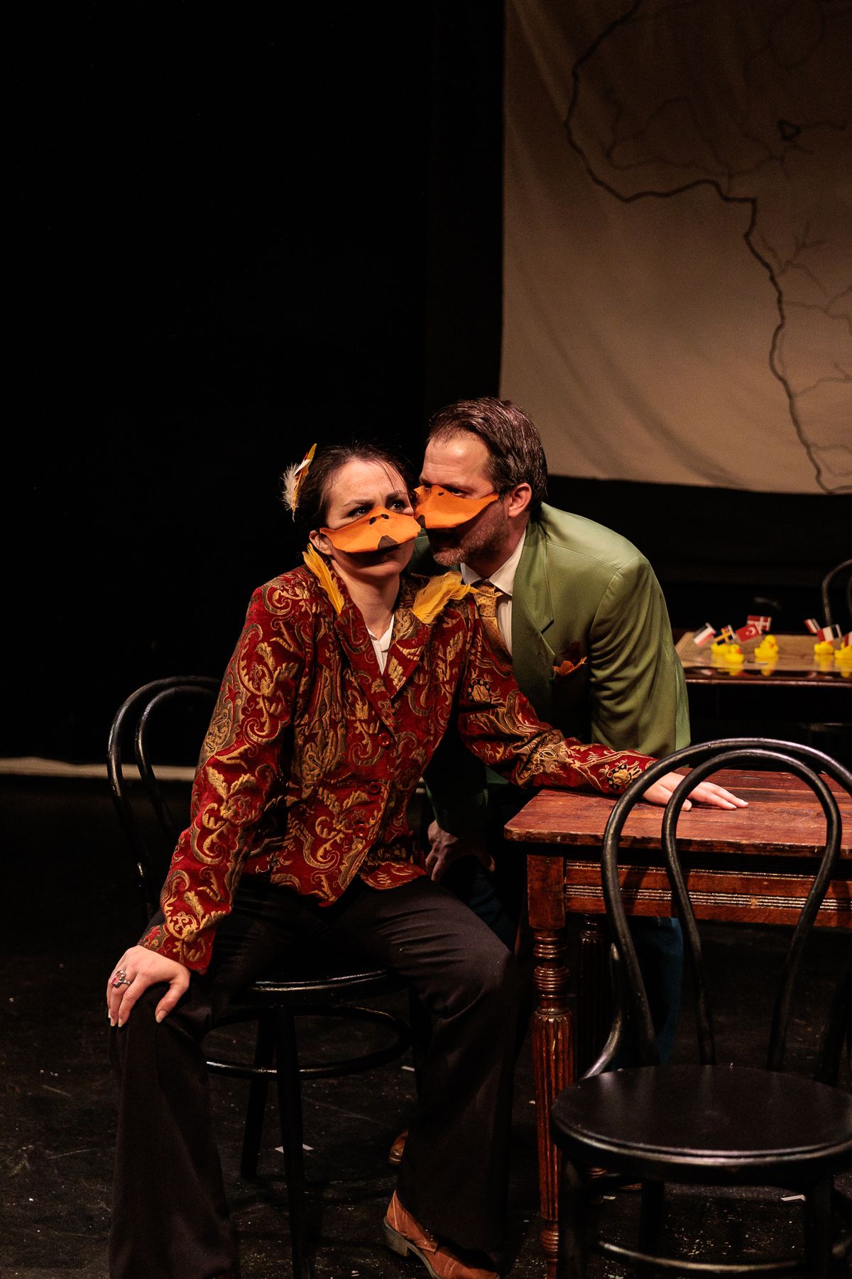 Mr. Duck (Nate Speckman, right) whispers in the ear of King Leopold II (Allison McCall, left) in Heart of Duckness by A.J. Ditty. Photo by Kat Moraros Photography. Mr. Duck (Nate Speckman, right) whispers in the ear of King Leopold II (Allison McCall, left) in Heart of Duckness by A.J. Ditty. Photo by Kat Moraros Photography.