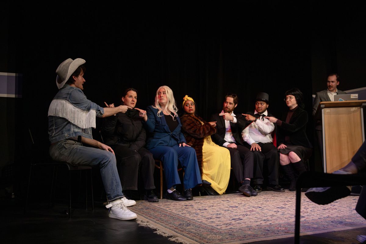 In this improvised murder mystery, the cast is trying to catch the killers amongst them - with the audience's help! In this improvised murder mystery, the cast is trying to catch the killers amongst them - with the audience's help!