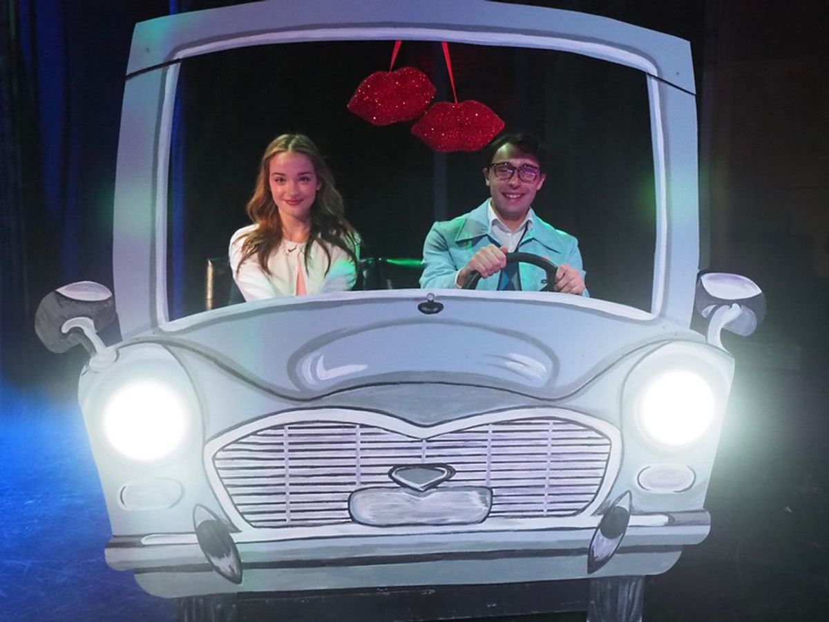 Brad (David Livingston) is an excellent driver. Just ask Janet (Maeve Lowney) Brad (David Livingston) is an excellent driver. Just ask Janet (Maeve Lowney)