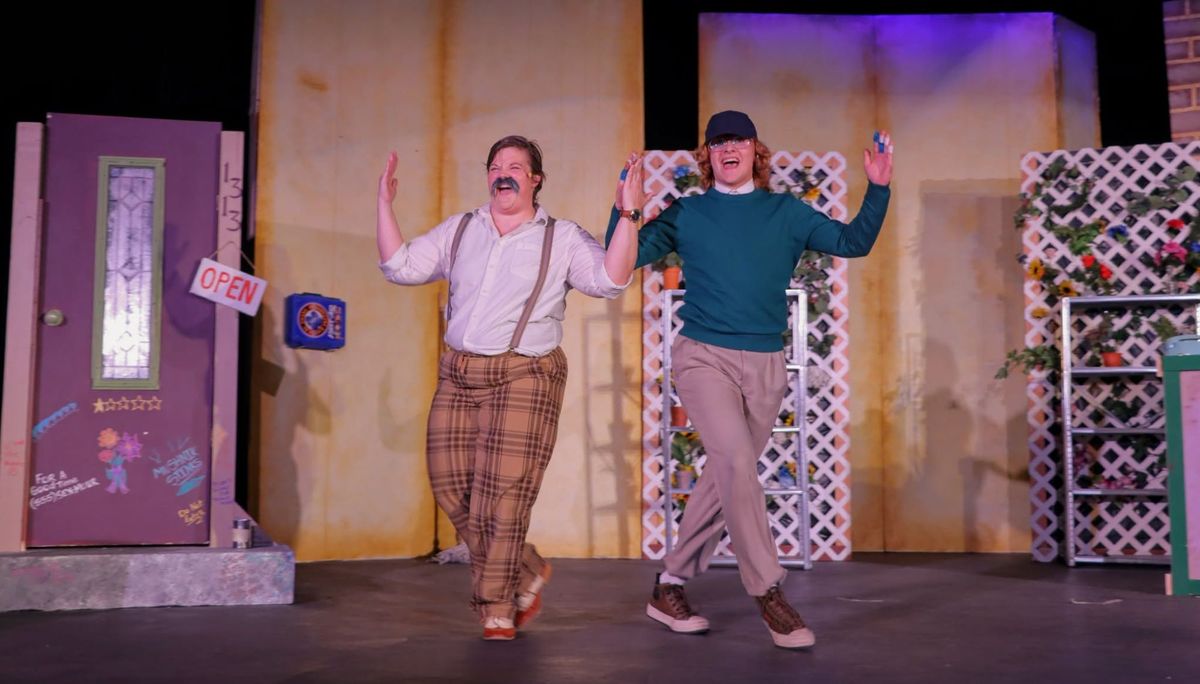 Mr Mushnik (Kat Schoofs) and Seymour (Kadin Henige)