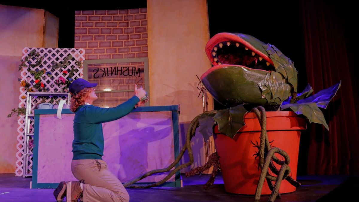 Seymour (played by Kadin Henige) and Audrey II Seymour (played by Kadin Henige) and Audrey II