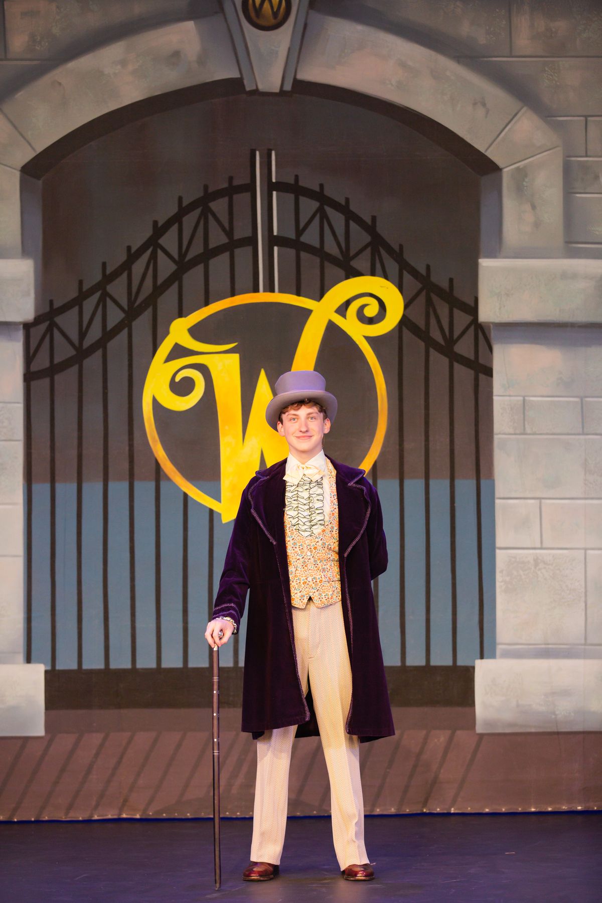 Mr. Willy Wonka (Oscar Argo) stands at the gates of his famous Chocolate Factory!